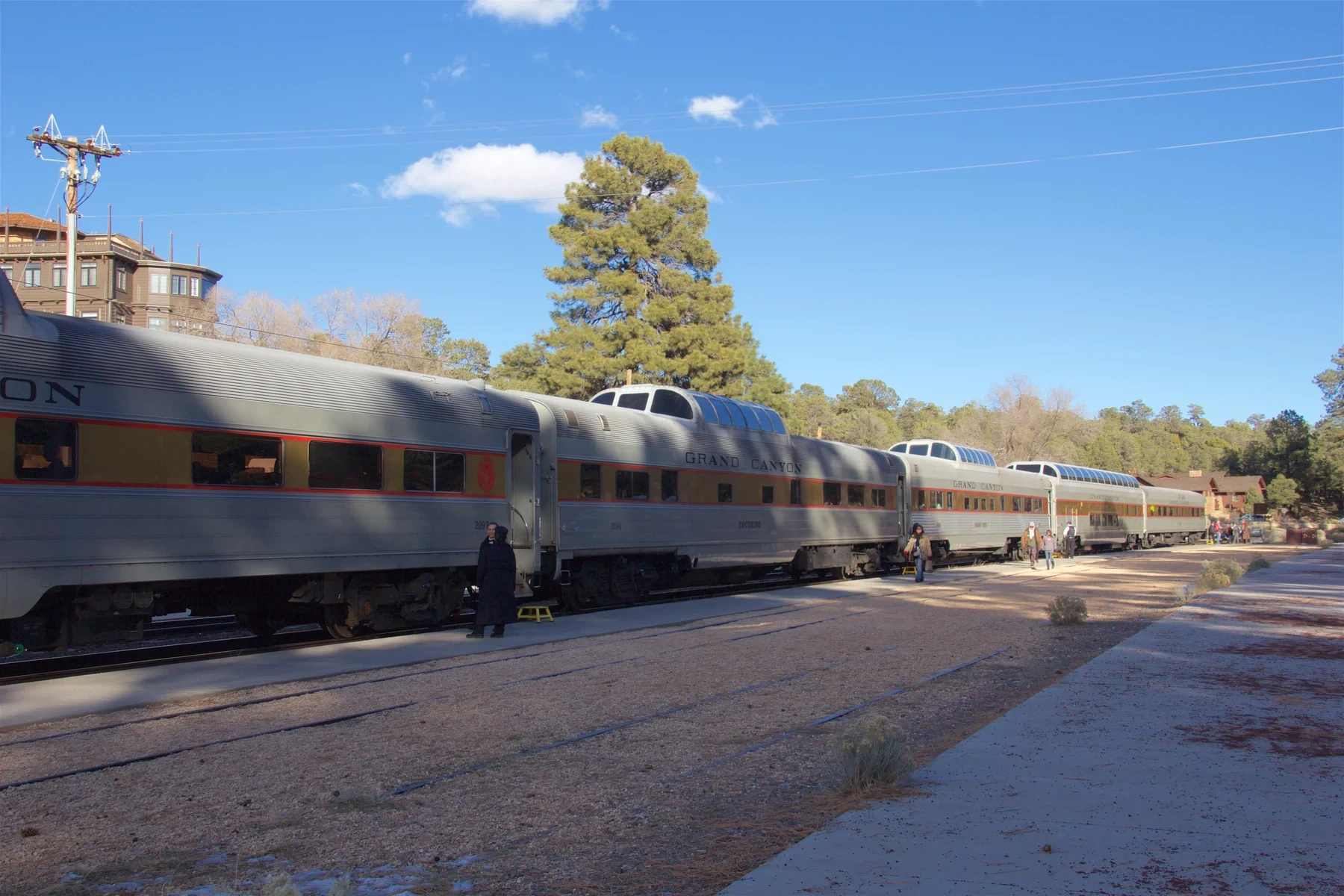 Silver Grand Canyon Railway passenger cars with observation domes at Grand Canyon Village.